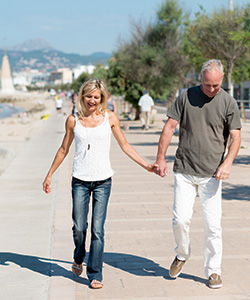Older couple on the boardwalk Older couple on the boardwalk